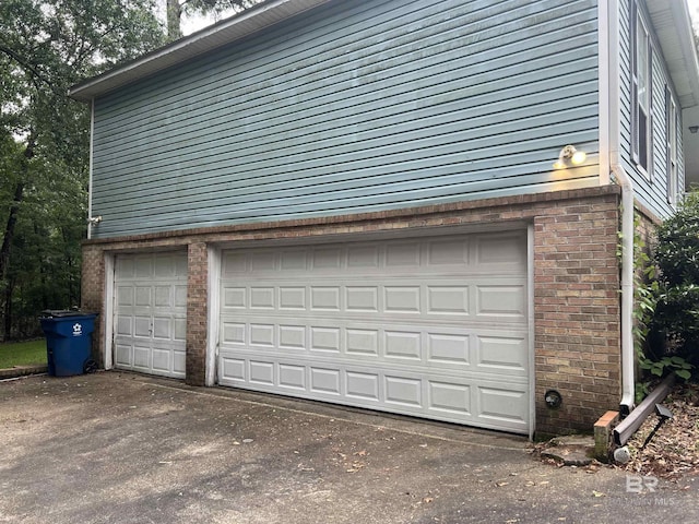 garage with driveway