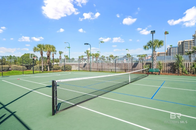 view of sport court with community basketball court and fence