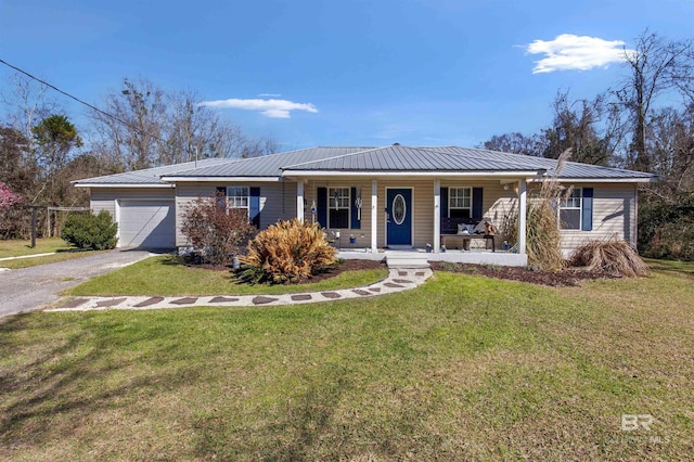 ranch-style house featuring aphalt driveway, covered porch, metal roof, a garage, and a front lawn