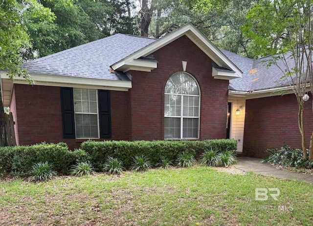 119 Sandlewood Cir, Daphne, AL 36526 - single story home with brick siding, a shingled roof, and a front lawn