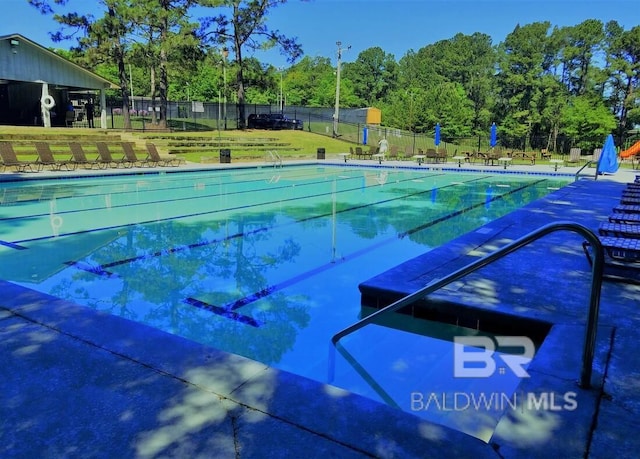 119 Sandlewood Cir, Daphne, AL 36526 - community pool with view of scattered trees