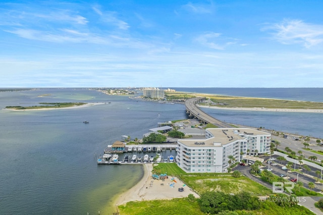 aerial view featuring a water view and a beach view