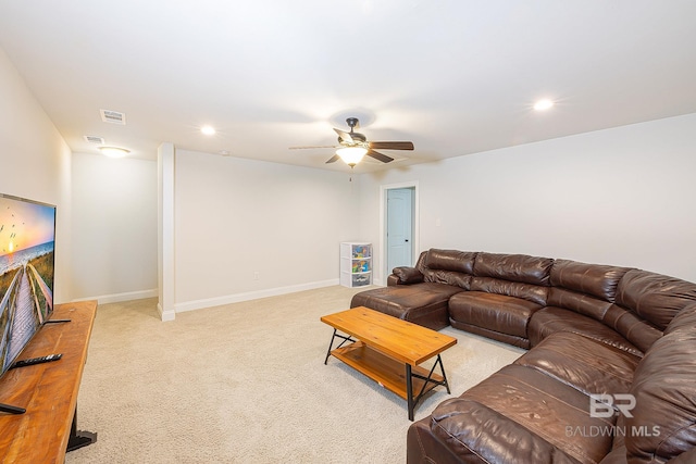 living room featuring ceiling fan and carpet floors