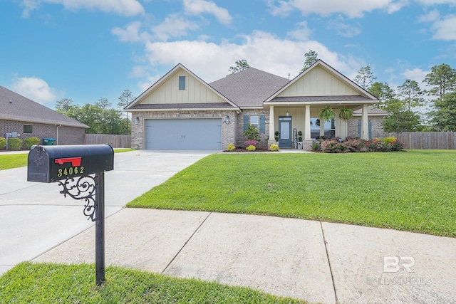 craftsman-style home with a front lawn and a garage