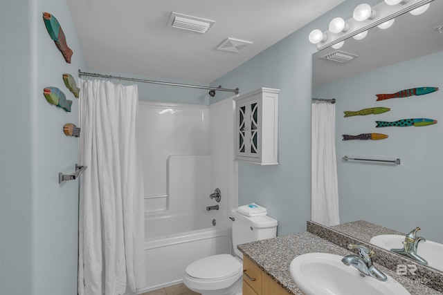 bathroom featuring visible vents, toilet, and vanity