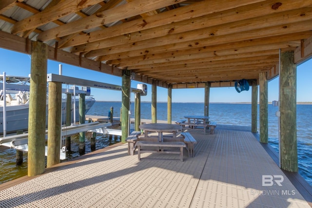 dock area featuring a water view and boat lift