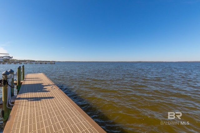 view of dock with a water view