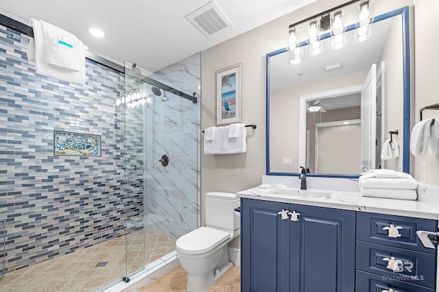 full bath featuring toilet, a shower stall, visible vents, and vanity