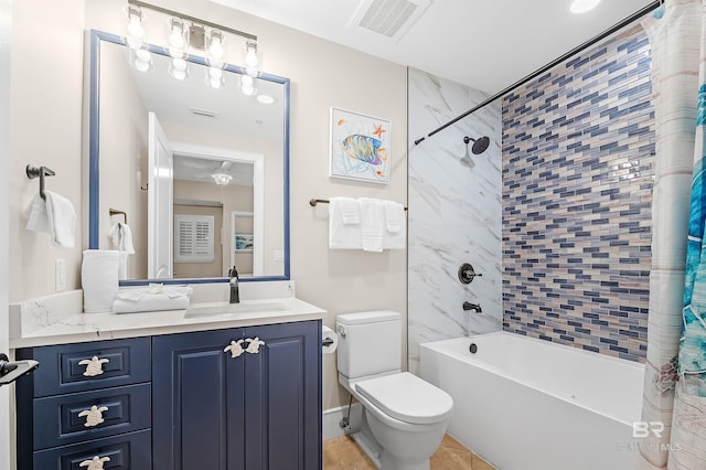 bathroom with toilet, shower / bath combination, visible vents, vanity, and tile patterned floors