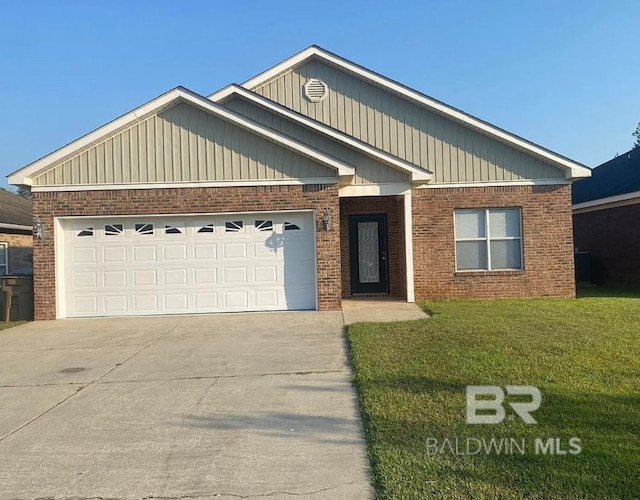view of front of property with concrete driveway, brick siding, and a front yard