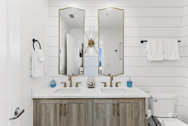 453 Dune Dr Unit 404, Gulf Shores, AL 36542 - bathroom with toilet and double vanity