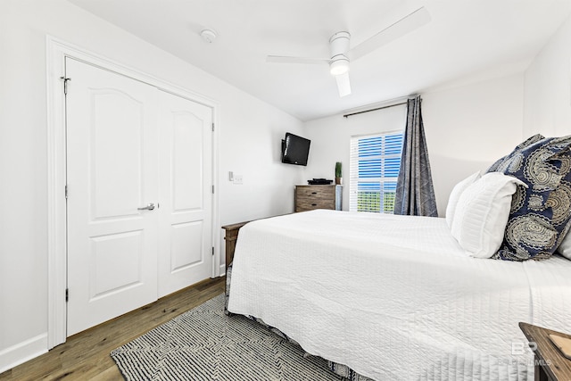 453 Dune Dr Unit 404, Gulf Shores, AL 36542 - bedroom with wood finished floors and ceiling fan