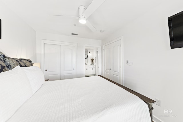 453 Dune Dr Unit 404, Gulf Shores, AL 36542 - bedroom featuring ensuite bath, ceiling fan, and a closet