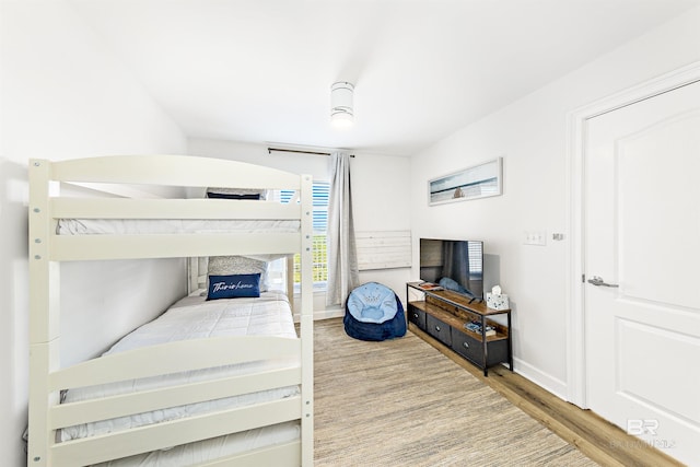 453 Dune Dr Unit 404, Gulf Shores, AL 36542 - bedroom with wood finished floors and baseboards