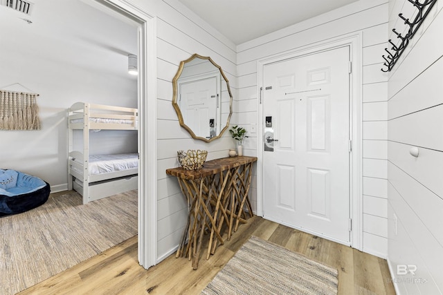 453 Dune Dr Unit 404, Gulf Shores, AL 36542 - entrance foyer with wood finished floors