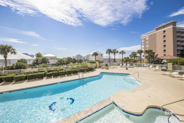 453 Dune Dr Unit 404, Gulf Shores, AL 36542 - community pool with a patio