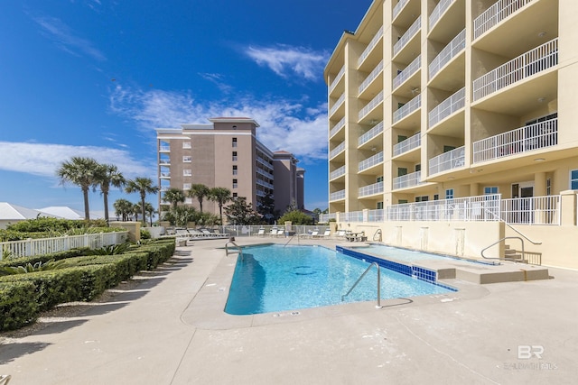 453 Dune Dr Unit 404, Gulf Shores, AL 36542 - community pool with a patio