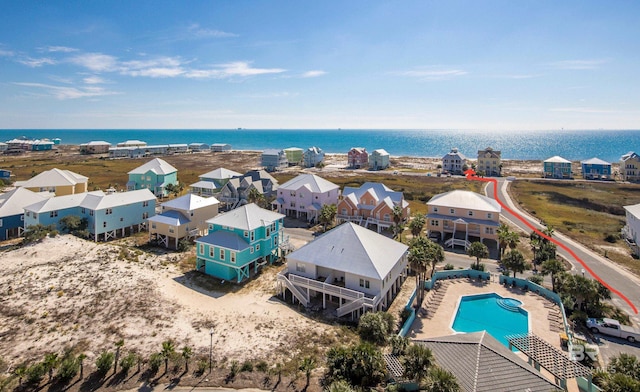 453 Dune Dr Unit 404, Gulf Shores, AL 36542 - aerial view of a large body of water and a pool area