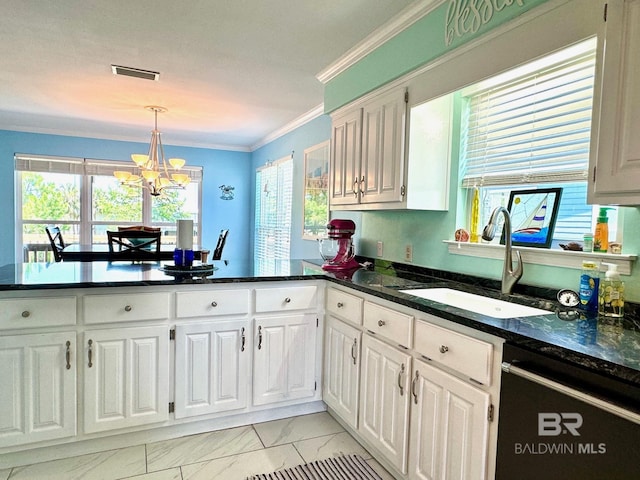 kitchen featuring a peninsula, a sink, white cabinets, dishwasher, and crown molding