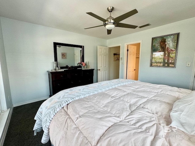 carpeted bedroom featuring a ceiling fan, baseboards, and visible vents