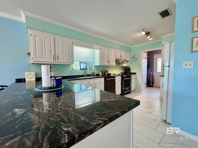 kitchen with visible vents, range with gas cooktop, under cabinet range hood, black dishwasher, and a sink