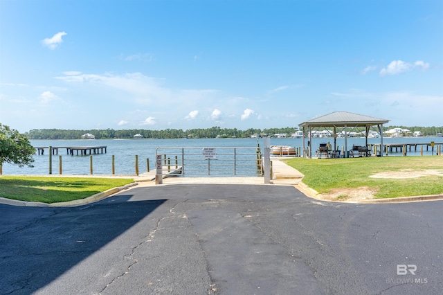 1872 W Beach Blvd Unit 206, Gulf Shores, AL 36542 - dock featuring a boat ramp and a water view