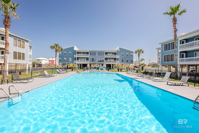 1872 W Beach Blvd Unit 206, Gulf Shores, AL 36542 - community pool featuring fence and a patio