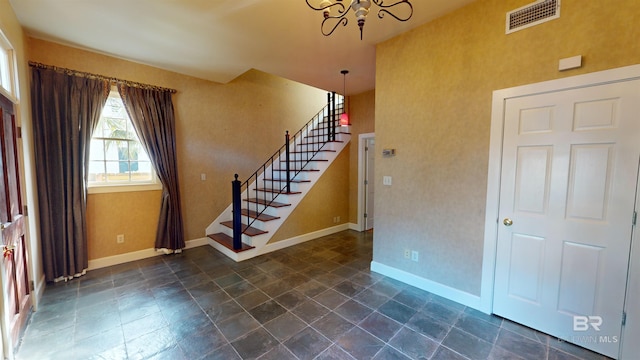 interior space with a chandelier