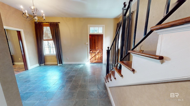 foyer featuring a notable chandelier