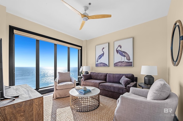 living room with a ceiling fan