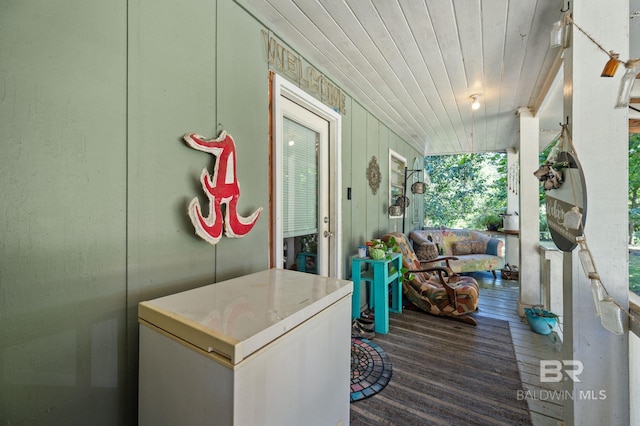 sunroom / solarium with wooden ceiling