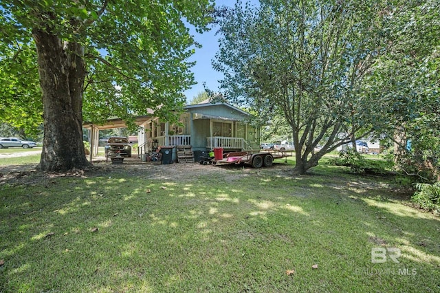 view of yard with a porch