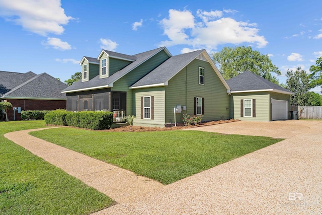 19083 County Road 13, Fairhope, AL 36532 - view of side of home with an attached garage, a lawn, concrete driveway, and a shingled roof