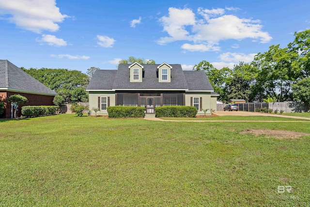 19083 County Road 13, Fairhope, AL 36532 - cape cod home featuring a sunroom