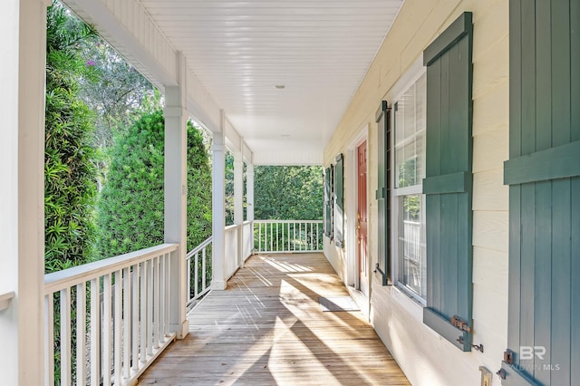 wooden deck featuring a porch