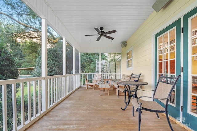 wooden terrace with ceiling fan