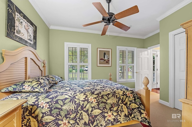 carpeted bedroom with ornamental molding, multiple windows, and ceiling fan