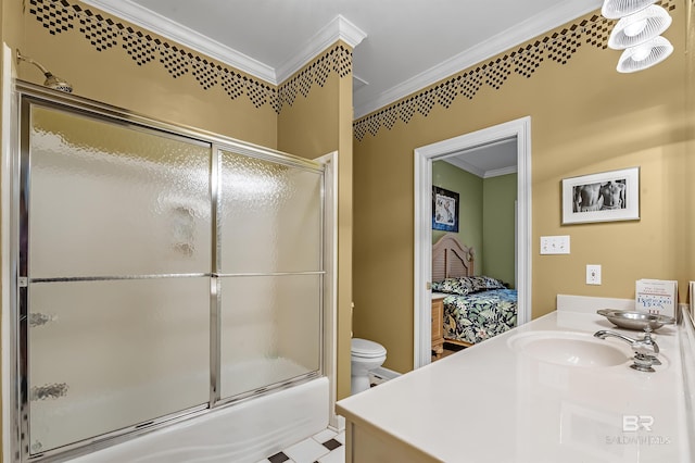 full bathroom with bath / shower combo with glass door, toilet, vanity, and ornamental molding