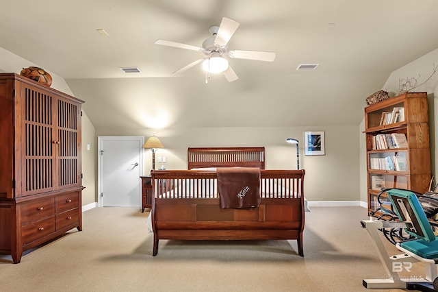 bedroom featuring light carpet, ceiling fan, and vaulted ceiling