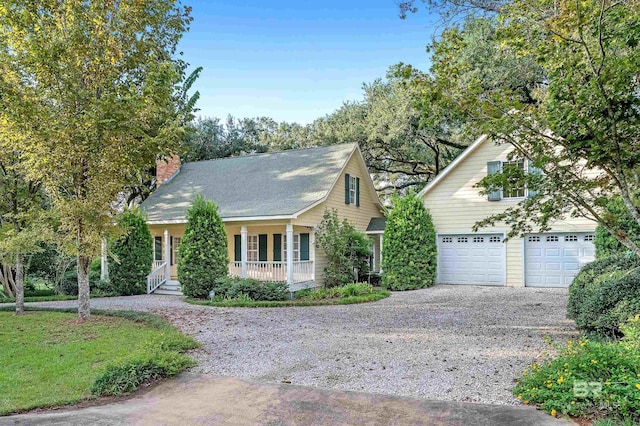 cape cod-style house featuring a porch