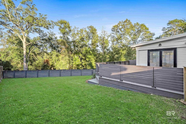 view of yard with a deck