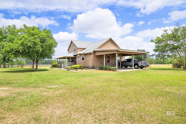 view of home's exterior featuring an attached carport and metal roof