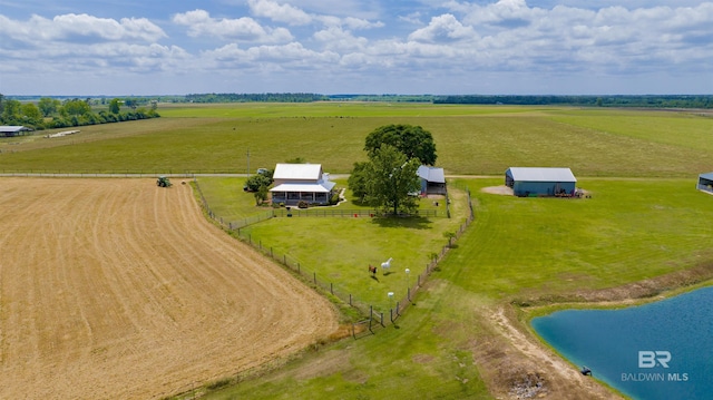 overview of rural landscape featuring a pastoral area and a large body of water