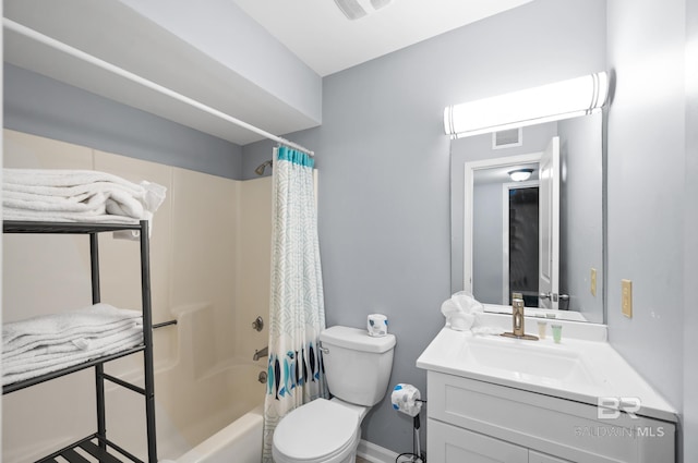 full bathroom with toilet, vanity, and shower / bath combo