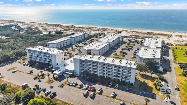 aerial view with a beach view and a water view