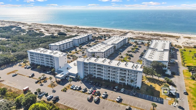 aerial view with a beach view and a water view