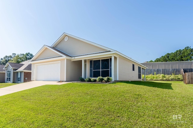 single story home featuring a garage and a front yard