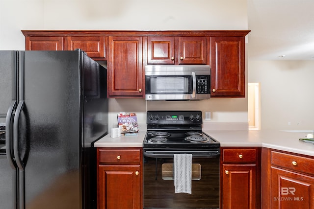 kitchen with black appliances