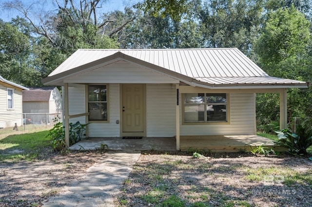 bungalow-style house featuring covered porch