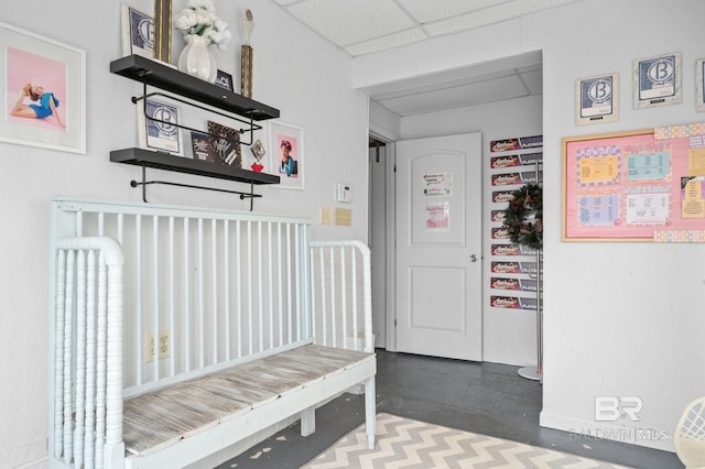 mudroom with a paneled ceiling